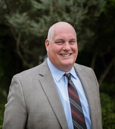 Head shot of Aaron Smith, Vice President, COO, and director of Human Resources