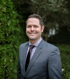 Headshot of Timothy Schram, Vice President and Marketing Director
