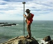 Land Surveying Example - Surveyor on Coastline