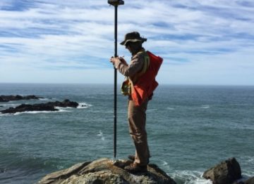 Dan at Stewarts Point - Land Surveying for a USGS Benchmark on the Northern California Coast