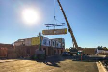 Modular Hotel Rooms Being Placed by Crane